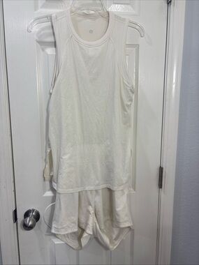 Lululemon Tank and short romper 3” Lemon sorbet size 6